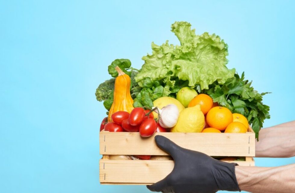 Male,Hands,In,Black,Protective,Gloves,Hold,A,Box,With